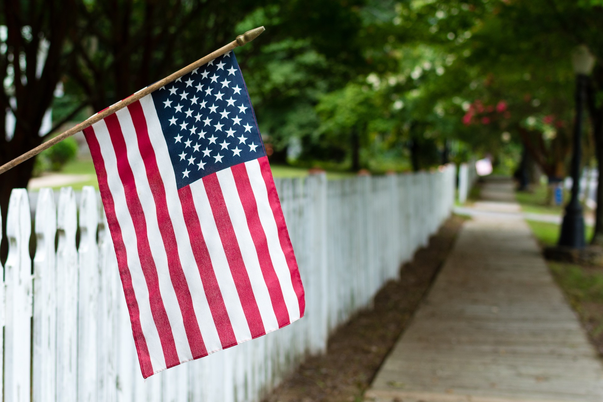 American Flag on a Picket Fence